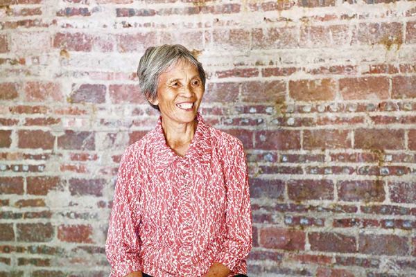 湖中村贫困户户主温阿婆笑容满面 罗婧文(广州大学新闻与传播学院学生)/ 摄